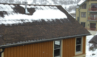 Electric roof deicing snow melting system.