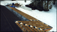 Zmesh roof heating element being installed.